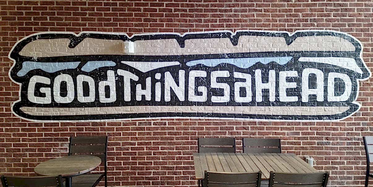 sandwich wall decal that reads "Good things ahead" in Georgia