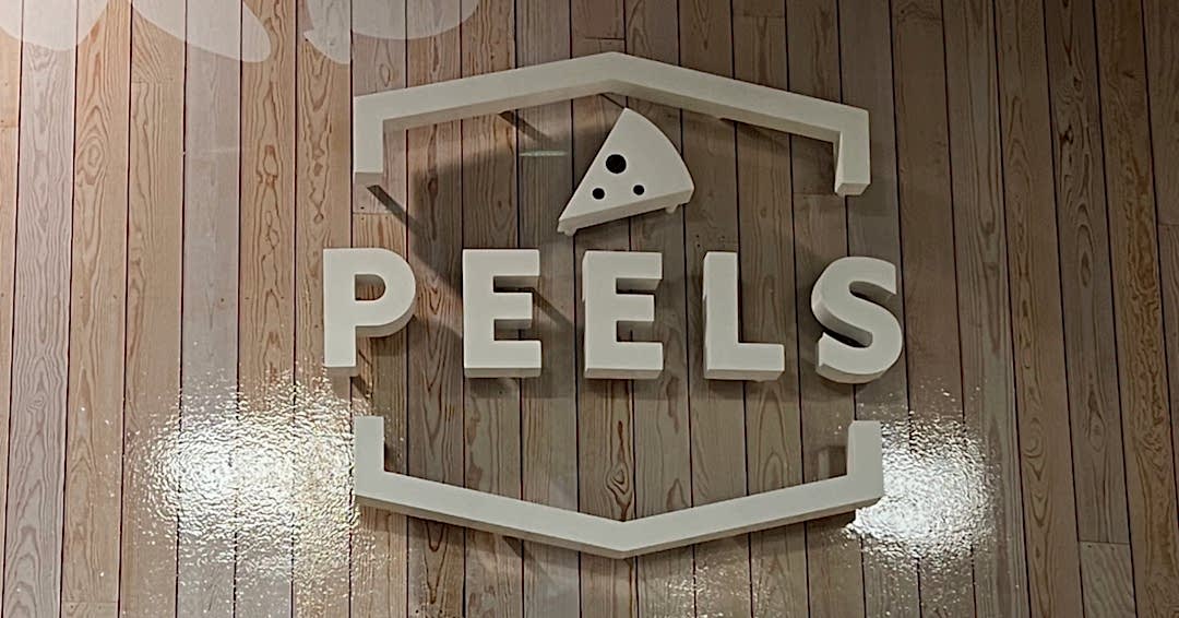 logo sign for Peels Pizza Georgia