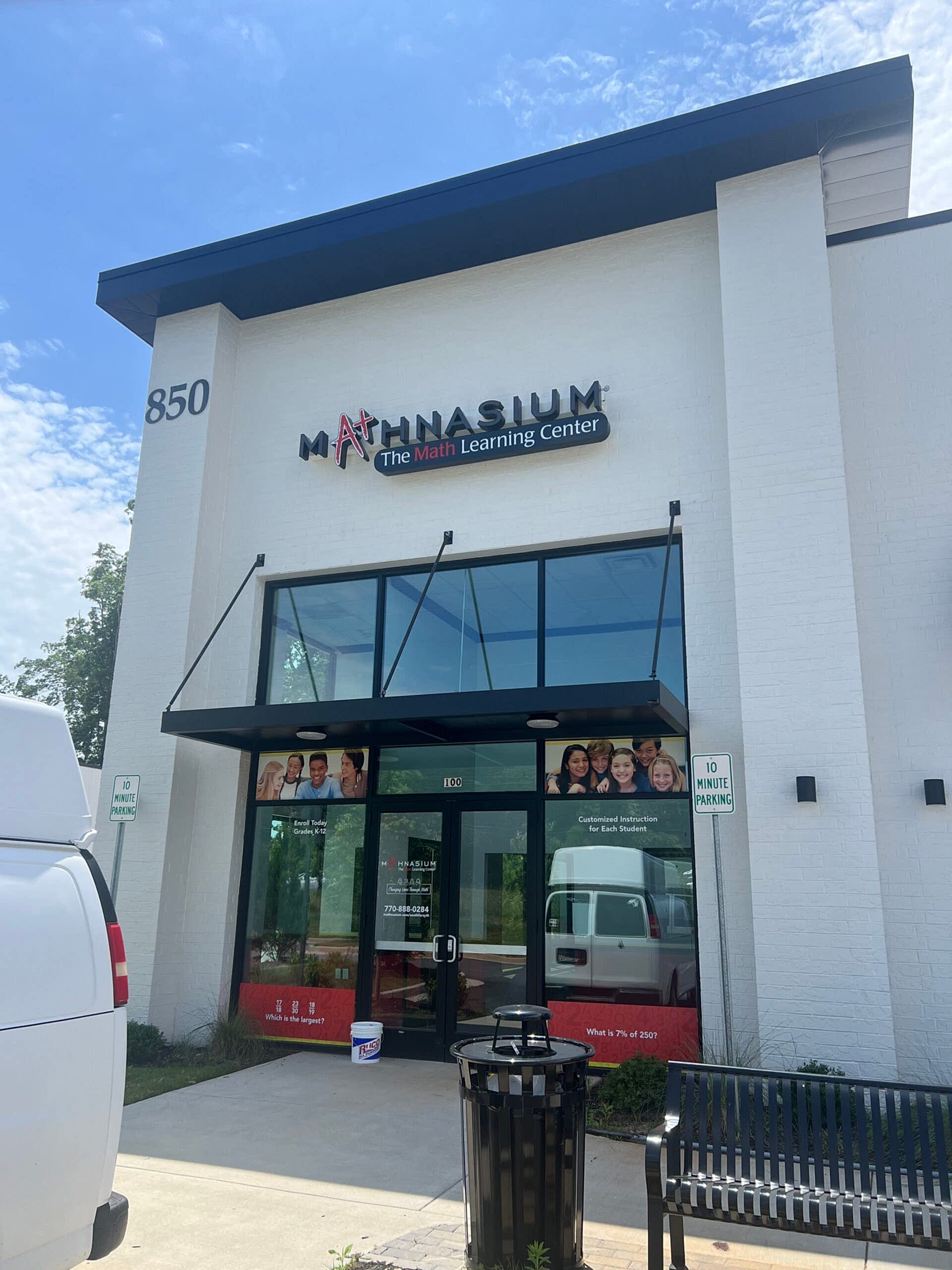 LED-illuminated channel letter sign for Mathnasium, mounted on a raceway above the storefront in Cumming, GA.