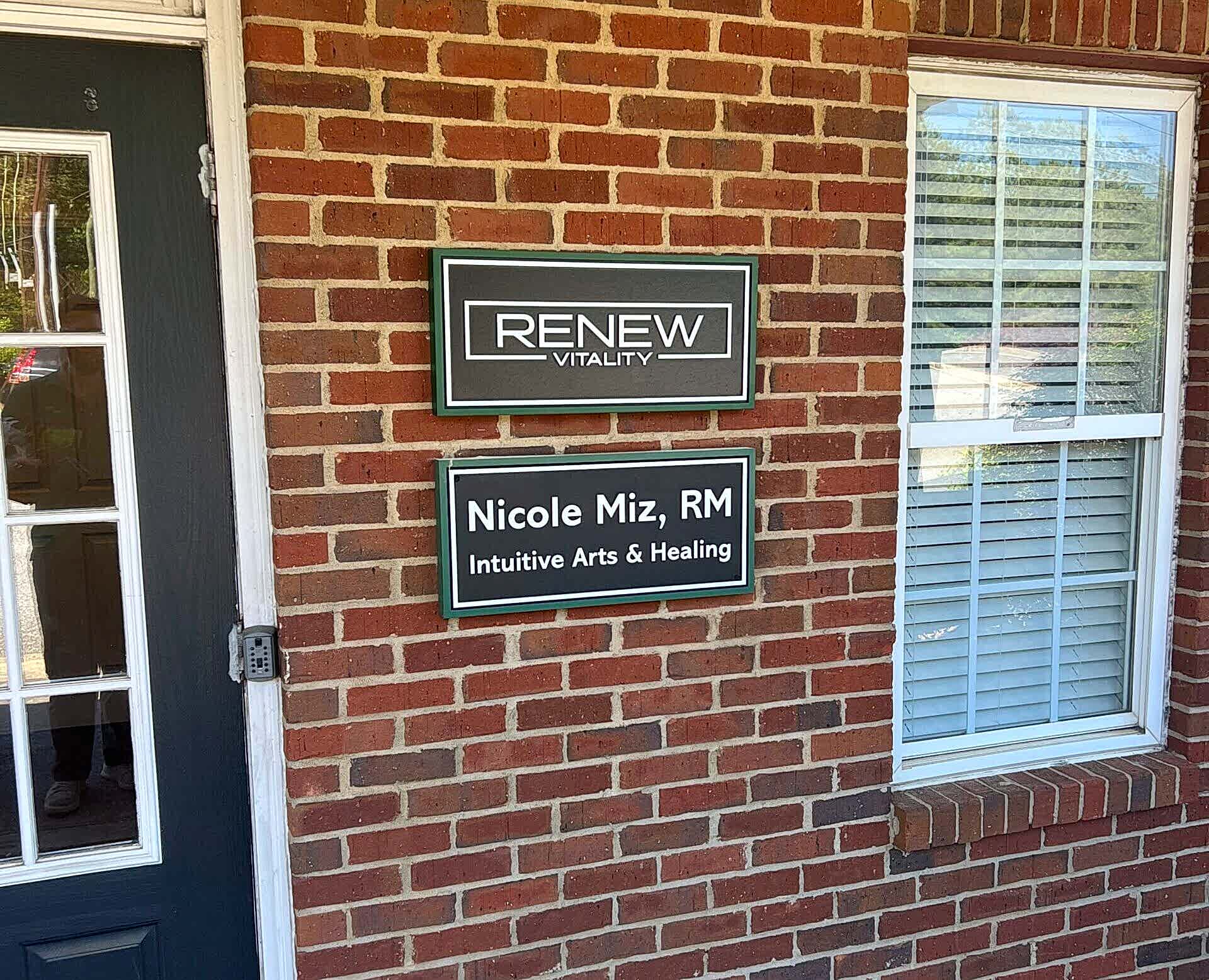 Hand-painted HDU sign for Renew Vitality in Alpharetta, GA, featuring CNC-routed details and mounted on a brick wall exterior