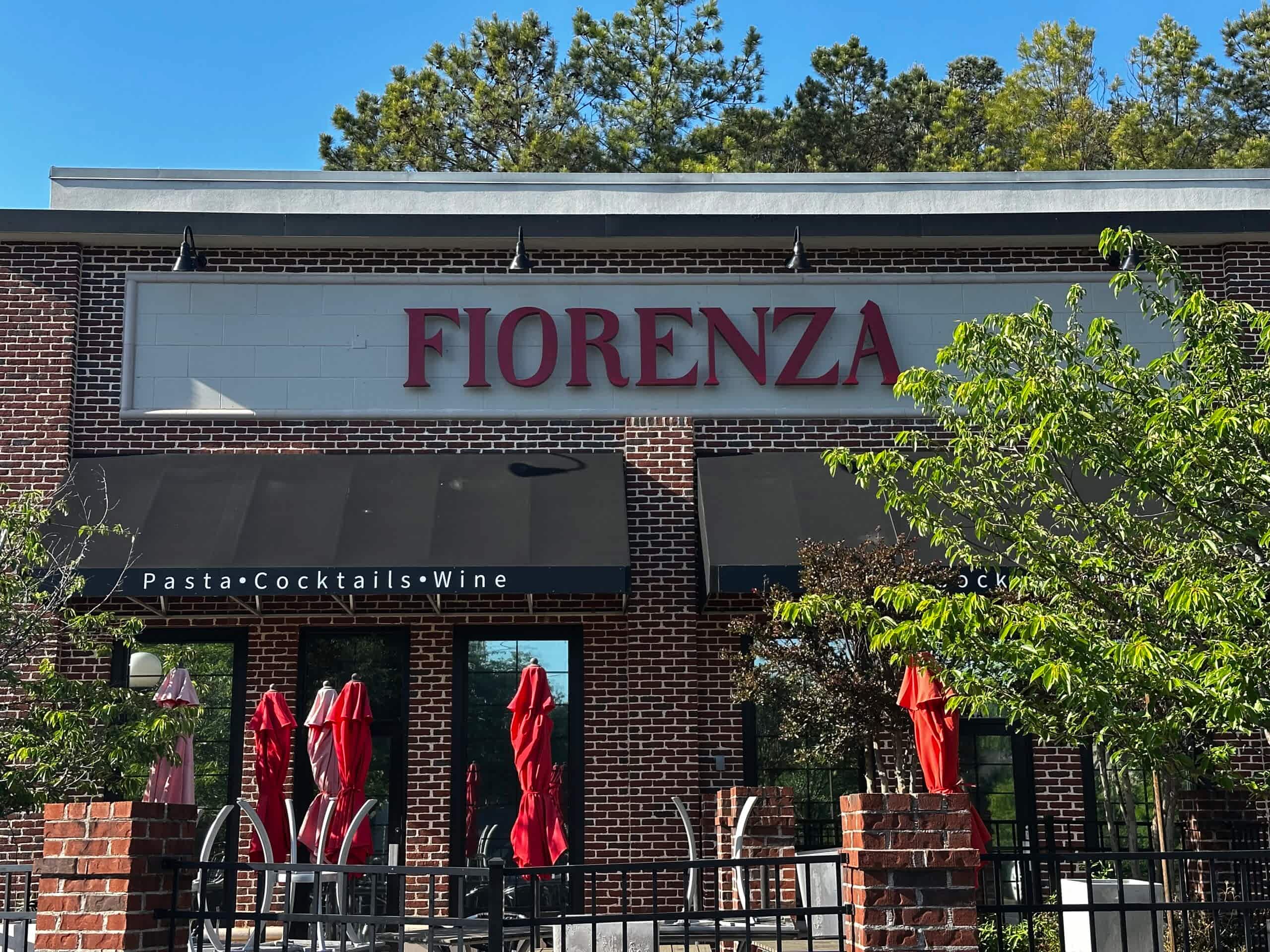 Halo-lit channel letter sign for Fiorenza restaurant in Alpharetta, GA, featuring red illuminated letters inspired by Florence, Italy, mounted on the building exterior.