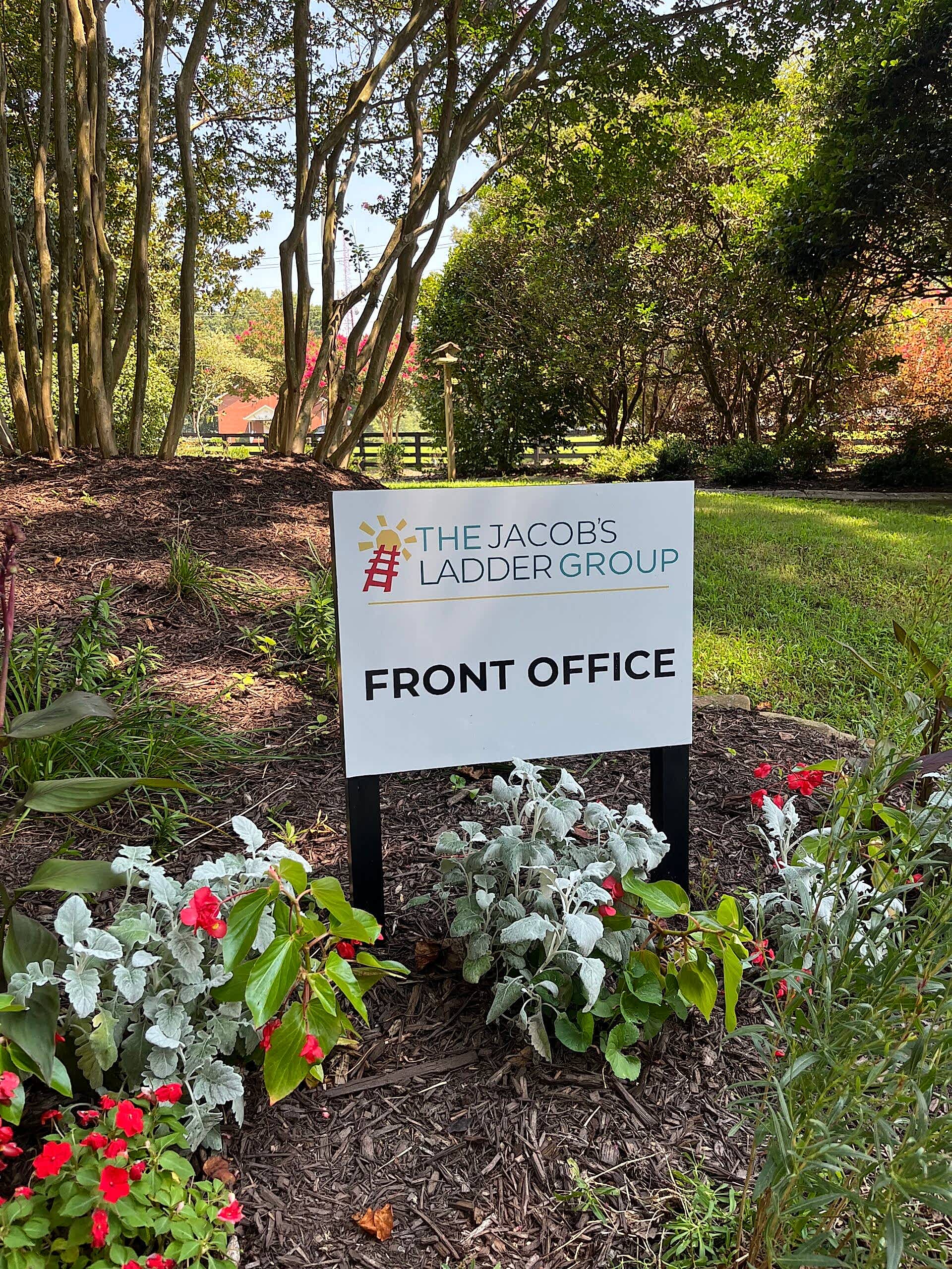 Updated wayfinding sign for The Jacob’s Ladder Group featuring new vinyl graphics that reflect the organization’s refreshed branding