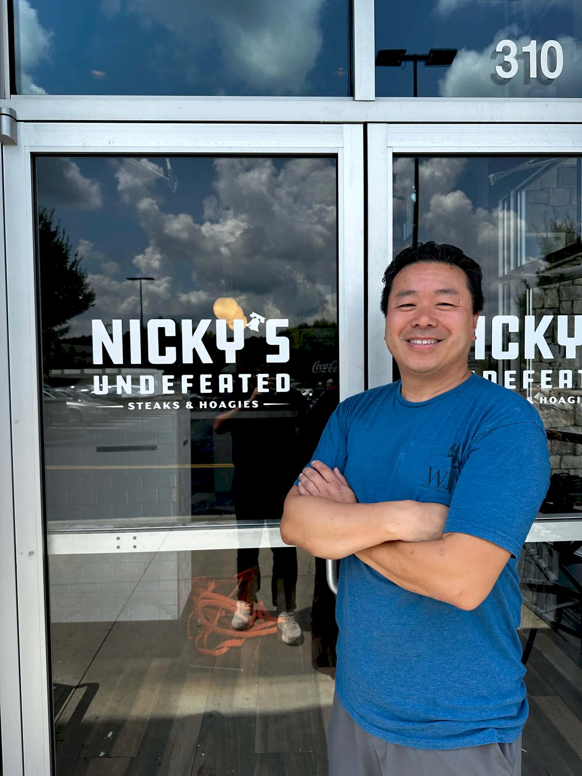 Custom window graphics for Nicky’s Undefeated in Kennesaw, GA, featuring branded graphics across the restaurant storefront.