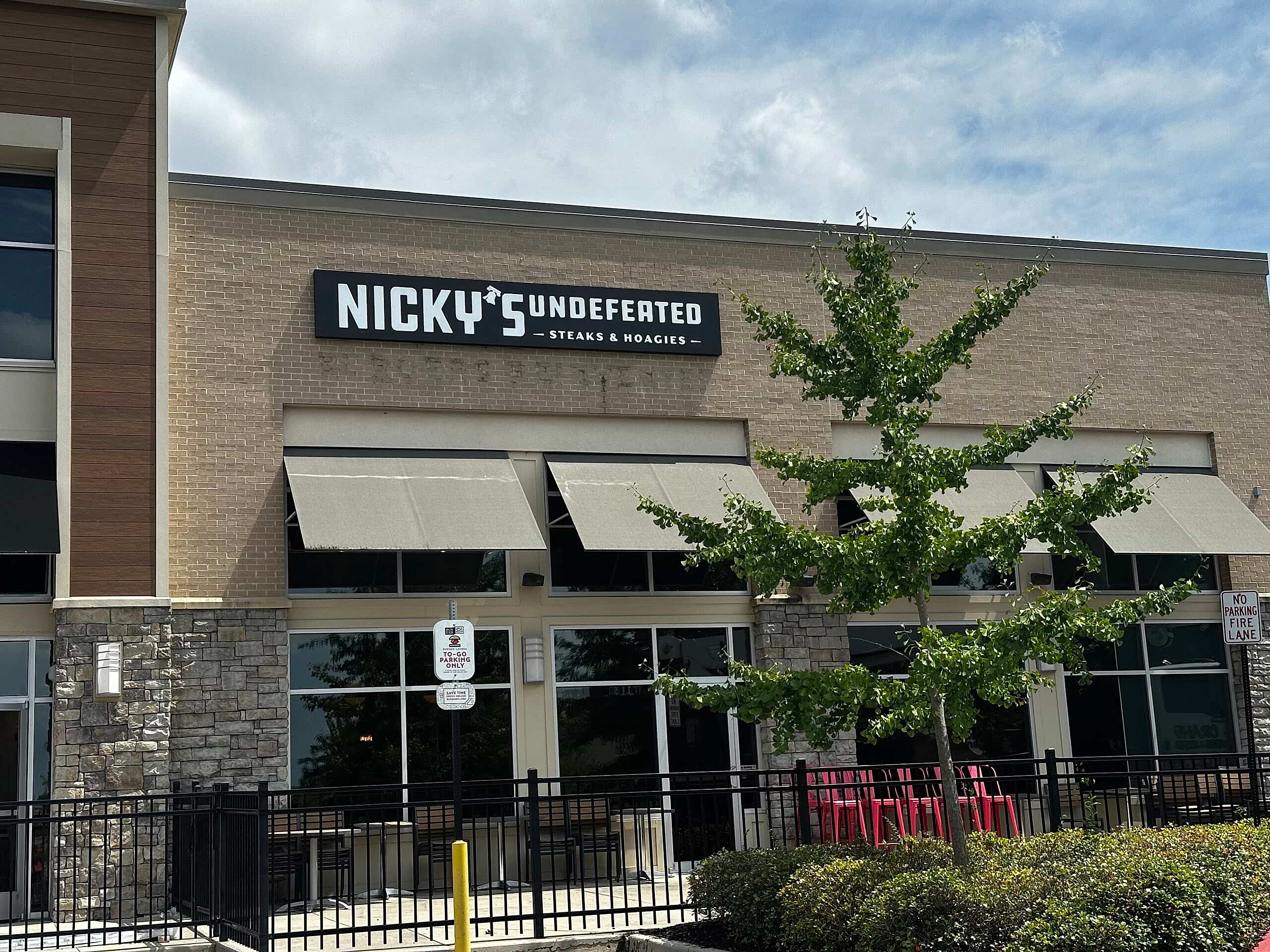 LED push-through acrylic building sign for Nicky’s Undefeated at their Kennesaw, GA restaurant location.