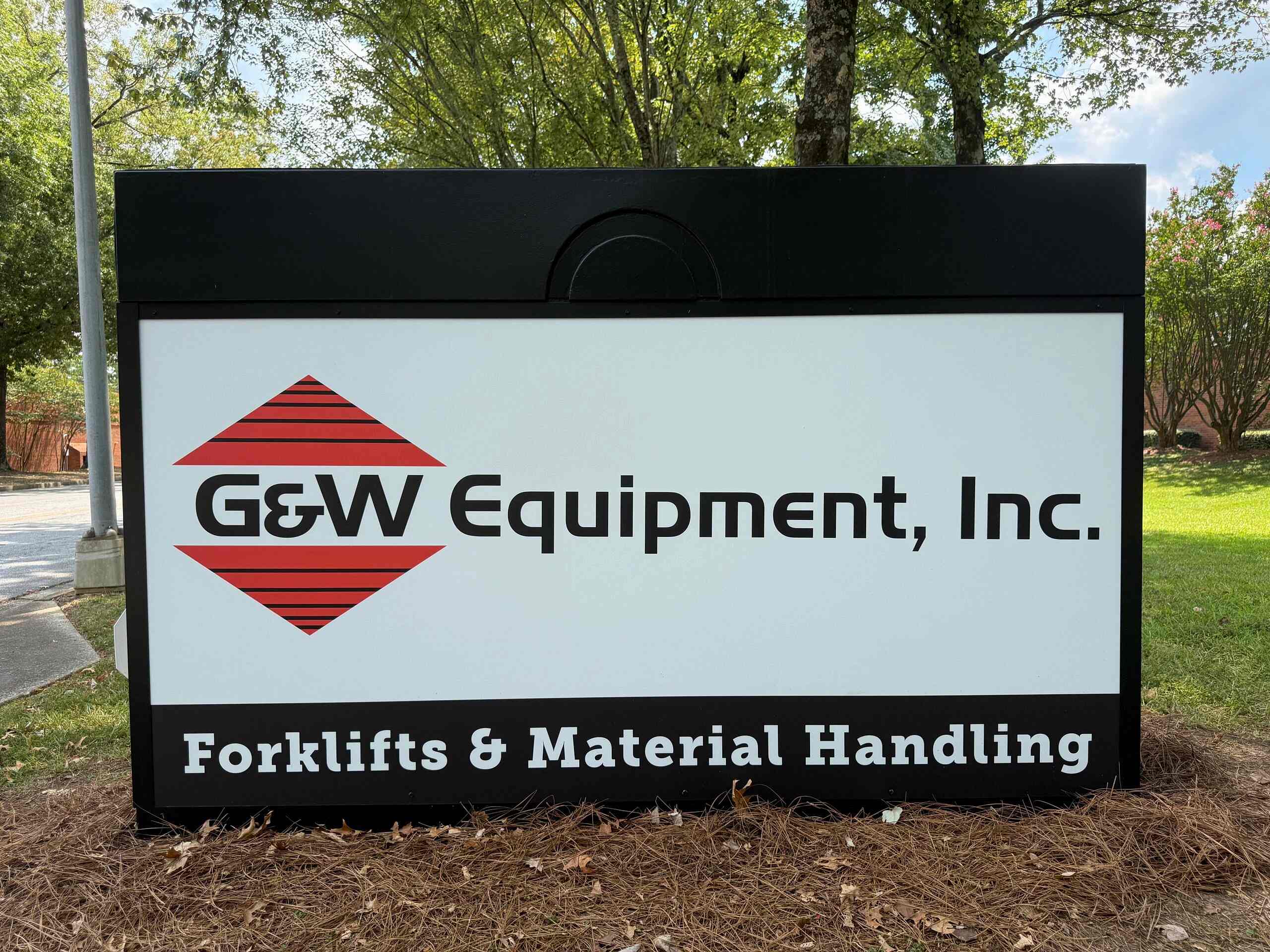 Updated monument sign for G&W Equipment, Inc. in Atlanta, GA, featuring the company logo and “Forklifts & Material Handling” messaging.